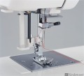 Janome 415 - nawlekacz