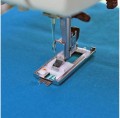 janome-825813016-stopka-do-obszywania-dziurek-Janome-rotak-polautomat-1_oues-ur.jpg