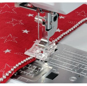 Stopka do naszywania koralików i pereł (2,5-4mm) Janome i Elna (rotacyjny 9mm)