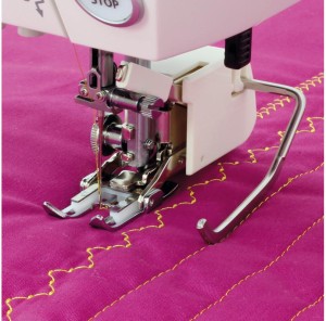 Stopka z górnym transportem z prowadnikiem Janome (otwarta, rotacyjny)