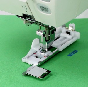 Stopka do obszywania dziurek Janome (rotacyjny 9mm, automat)