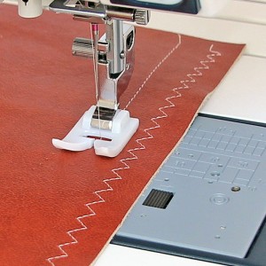 Stopka teflonowa z płytką ściegową Janome (rotacyjny 9mm)