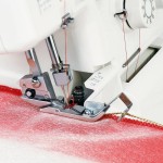 Stopka do wszywania sznurka do owerloka Janome AT2000D