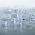 Szpulka plastikowa do maszyn Pfaff, przezroczysta, 10 szt.