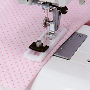 Stopka do półautomatycznego obszywania dziurek na wymiar guzika (chwytacz wahadłowy)