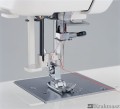 Janome 920 - nawlekacz